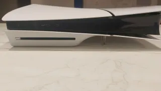 Consola PS5(1TB) con lector + 2 mandos + juegos