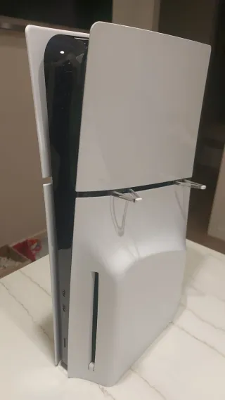 Consola PS5(1TB) con lector + 2 mandos + juegos