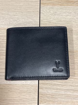 Cartera YANKO, piel negra. Nueva a estrenar.