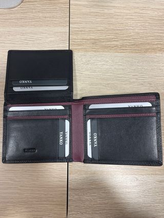 Cartera YANKO, piel negra. Nueva a estrenar.