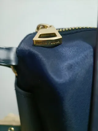 Bolso azul BIMBA Y LOLA con etiqueta