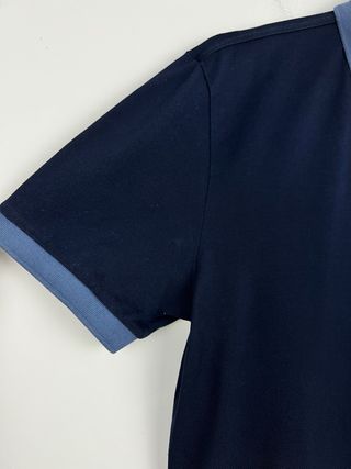 Prada Polo Azul Marino logo