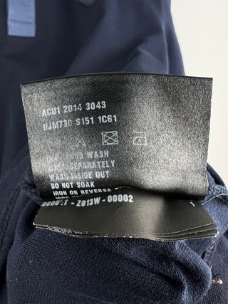 Prada Polo Azul Marino logo