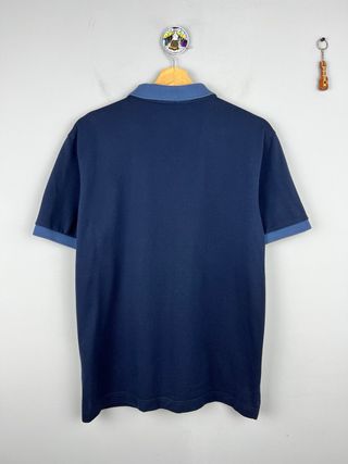 Prada Polo Azul Marino logo