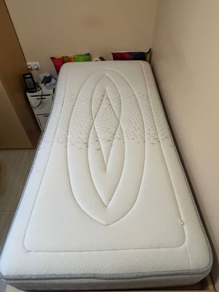 Cama individual con dos fundas nórdicas y nordico