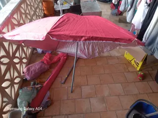 Sombrilla de tela rosa