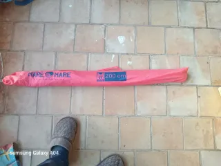 Sombrilla de tela rosa