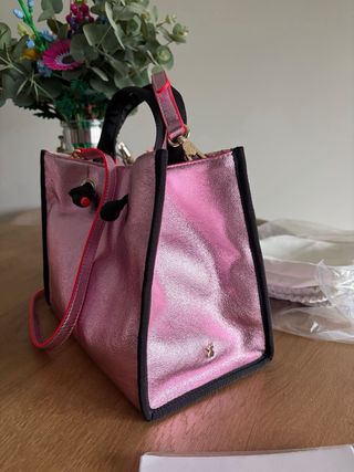 Bolso Tous bandolera rosa y negro