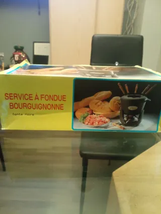 Juego de fondue de hierro