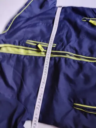 Cortavientos niño azul y amarillo