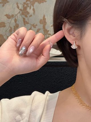 Pendientes oro champán abanico