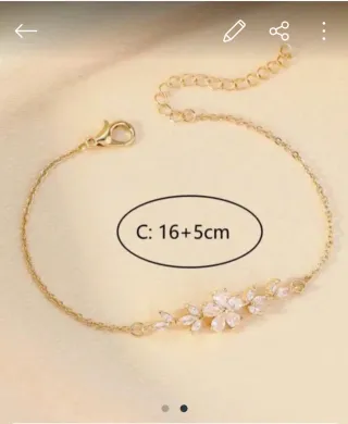 Colgante y pulsera dorado con flores de cristal