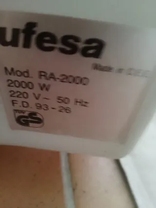 Estufa Ufesa Negra y Blanca