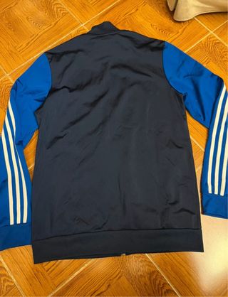 Chaqueta deportiva Adidas azul y negra