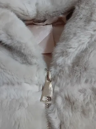 Cappotto finta pelliccia con cappuccio donna