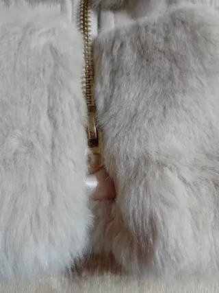 Cappotto finta pelliccia con cappuccio donna