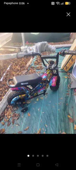 Mini moto eléctrica infantil