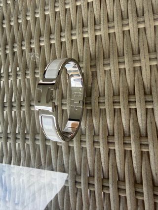 Pulsera Hermès Plata y Blanco