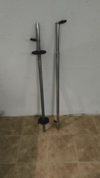 Soporte metálico para barra de pesas