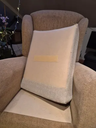 Butaca de tela en tonos beige