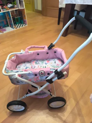 Cochecito de muñecas rosa