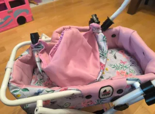 Cochecito de muñecas rosa