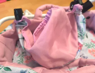 Cochecito de muñecas rosa