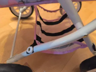 Cochecito de muñecas rosa