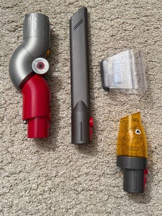 Aspirador Dyson con accesorios