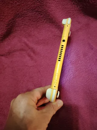 Nintendo Switch Lite Amarilla + Juego