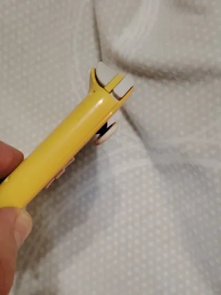 Nintendo Switch Lite Amarilla + Juego