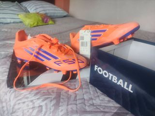 Botas Fútbol F50 Club FG/MG Naranja Talla 37