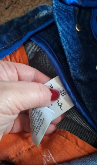 Jeans uomo strappati taglia 48