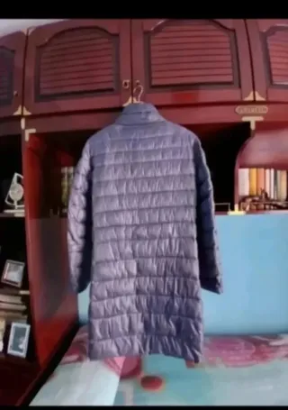 Abrigo largo azul acolchado