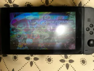 Nintendo Switch + Mario Kart 8 + Mando Zelda