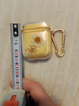 Airpods y Funda trasparente con flor seca