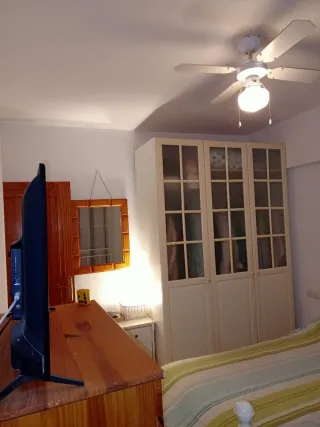 Casa adosada, tipo dúplex.