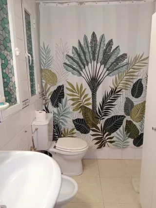 Casa adosada, tipo dúplex.