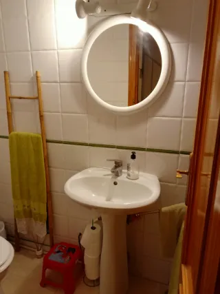 Casa adosada, tipo dúplex.