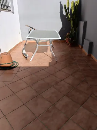 Casa adosada, tipo dúplex.