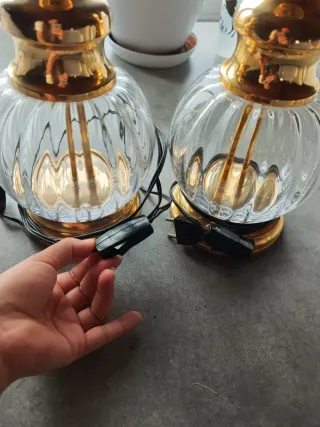 Lámparas de cristal y metal doradas