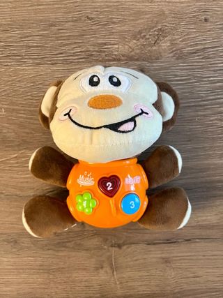 Mono de peluche musical para bebé