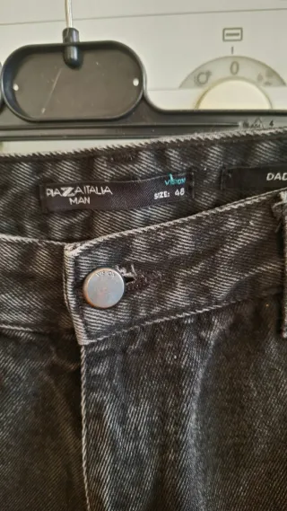 Jeans uomo neri strappati taglia 48