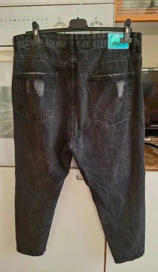 Jeans uomo neri strappati taglia 48