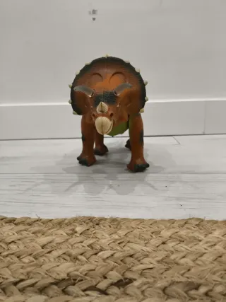 Dinosaurio con luces, sonido y movimiento