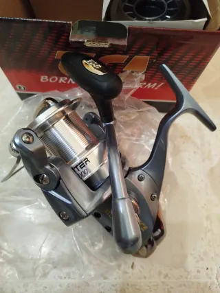 Carrete de pesca surcasting tica