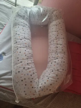 Nido para bebé con puntos