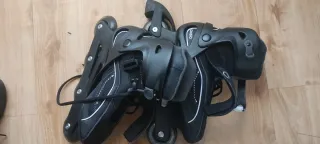 Patines de caballero negros,con bolsa y rodilleras