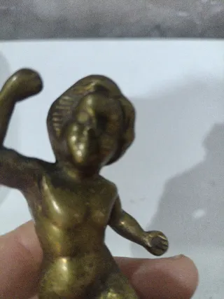 Figura de bronce