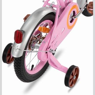 Bicicleta infantil rosa con cesta y ruedas de 16”
